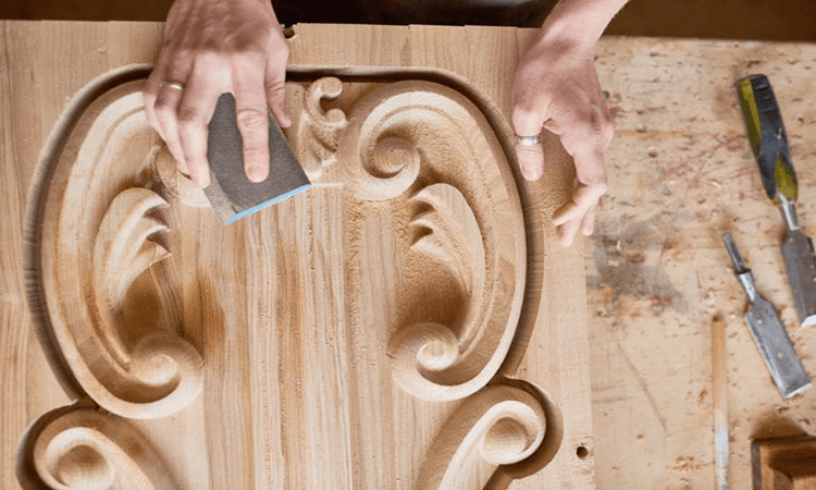 carved furniture sanding process